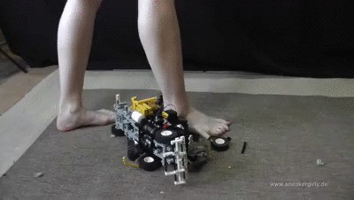 Sneaker-girl Denise Crushes A Big Lego-toy-truck